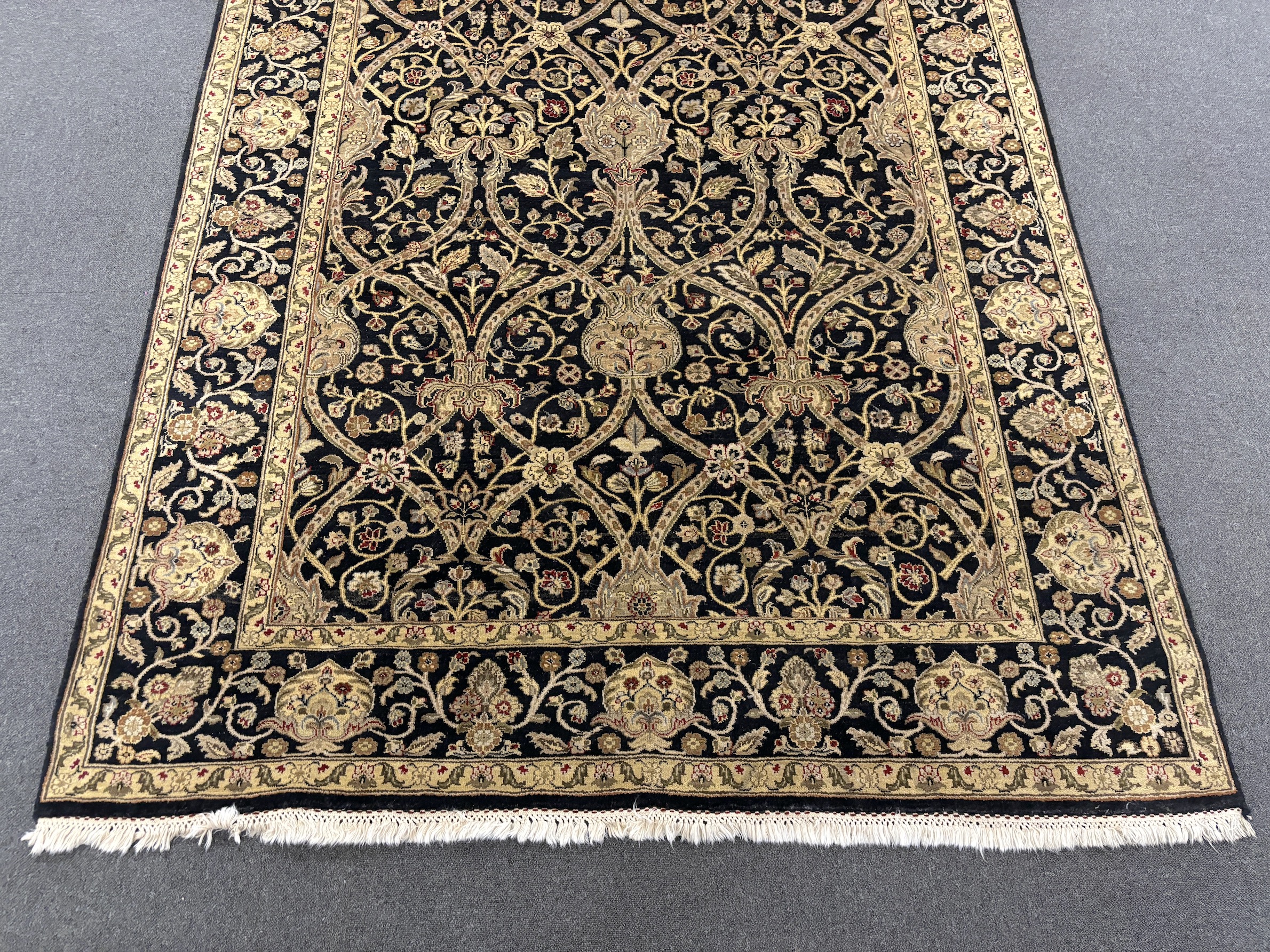 A Lahore carpet, 274 x 181cm